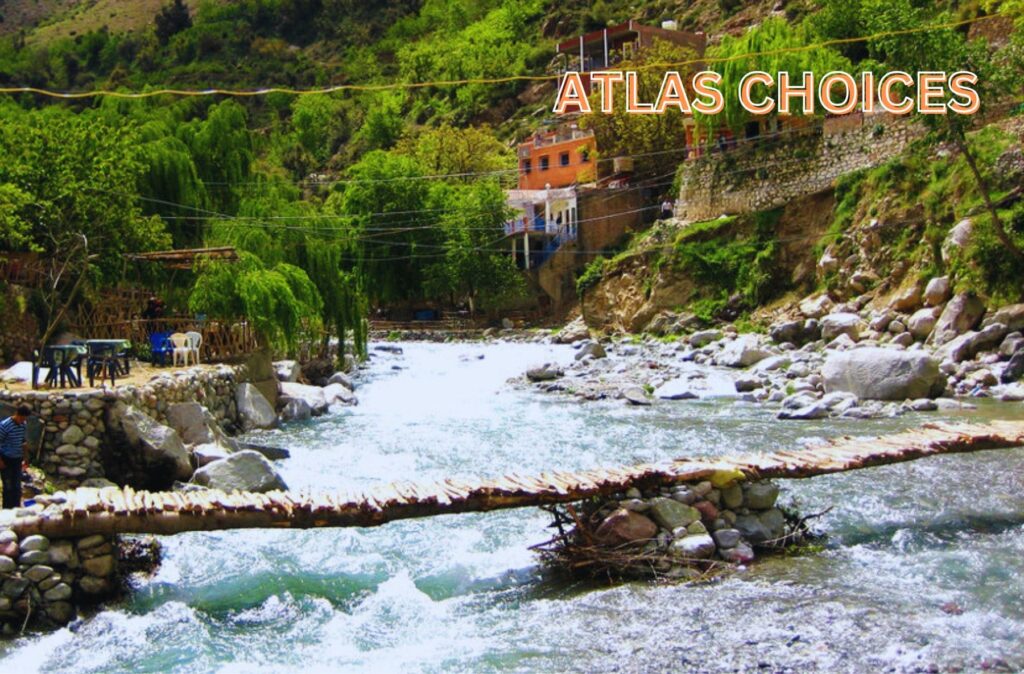 Crystal-clear waterfalls in Ourika Valley surrounded by rocks and vegetation.