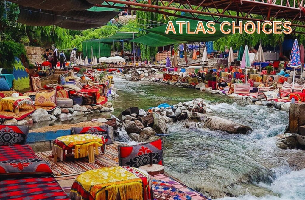 Moroccan tagine served on a riverside table with scenic views of Ourika Valley.