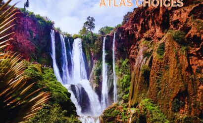 Majestic Ouzoud Waterfalls in Morocco surrounded by lush greenery, a perfect day trip from Marrakech.