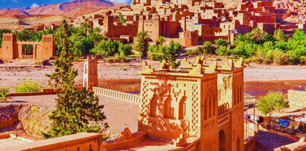 A view of Kasbah Ait Ben Haddou with its distinctive earthen buildings and dramatic backdrop.