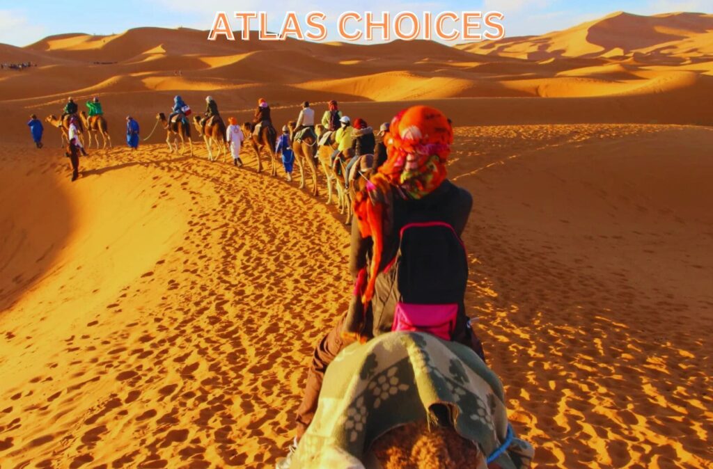 Tourists enjoying camel rides in the Agafay Desert near Marrakech.