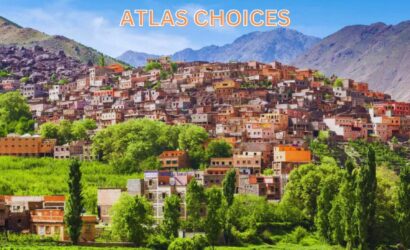 Winding road through green valleys and Berber villages in the Atlas Mountains.