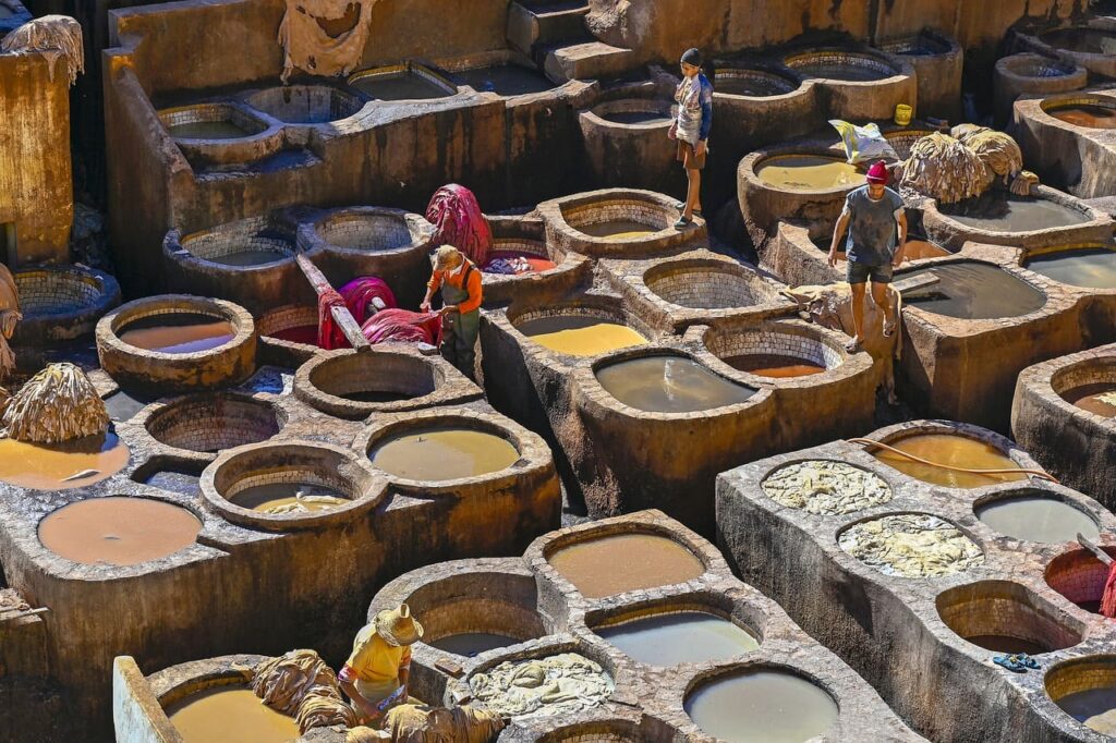 A panoramic view of the historic Medina of Fes, Morocco, showcasing its vibrant markets and ancient architecture.